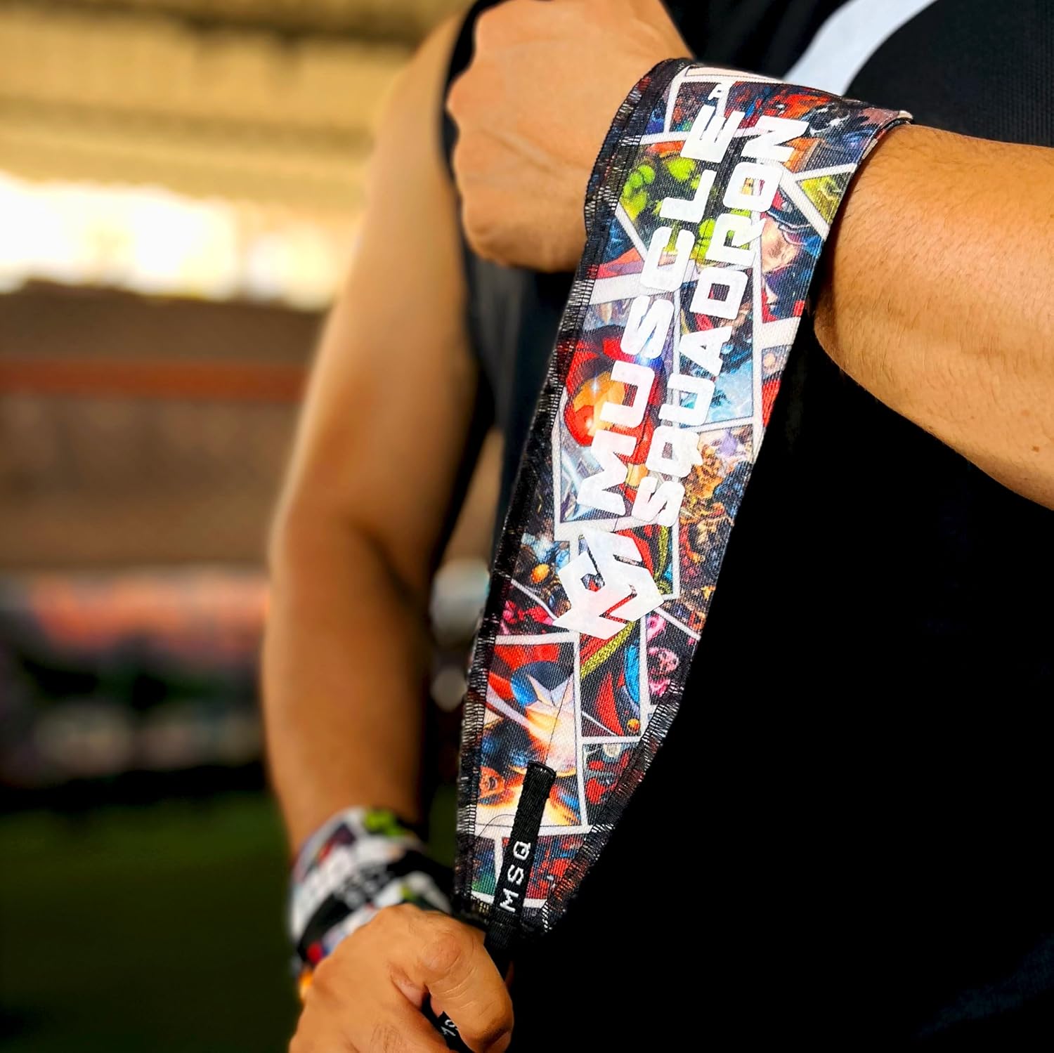 Close-up of a hand gripping a pull-up bar, wearing Gripzora Primal Matrix calisthenics wrist wraps for enhanced stability and injury prevention.