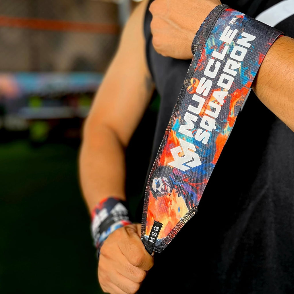 Close-up of a man's wrist, showing Gripzora's Rogue Graffiti wrist wraps providing firm stability and support during a workout.