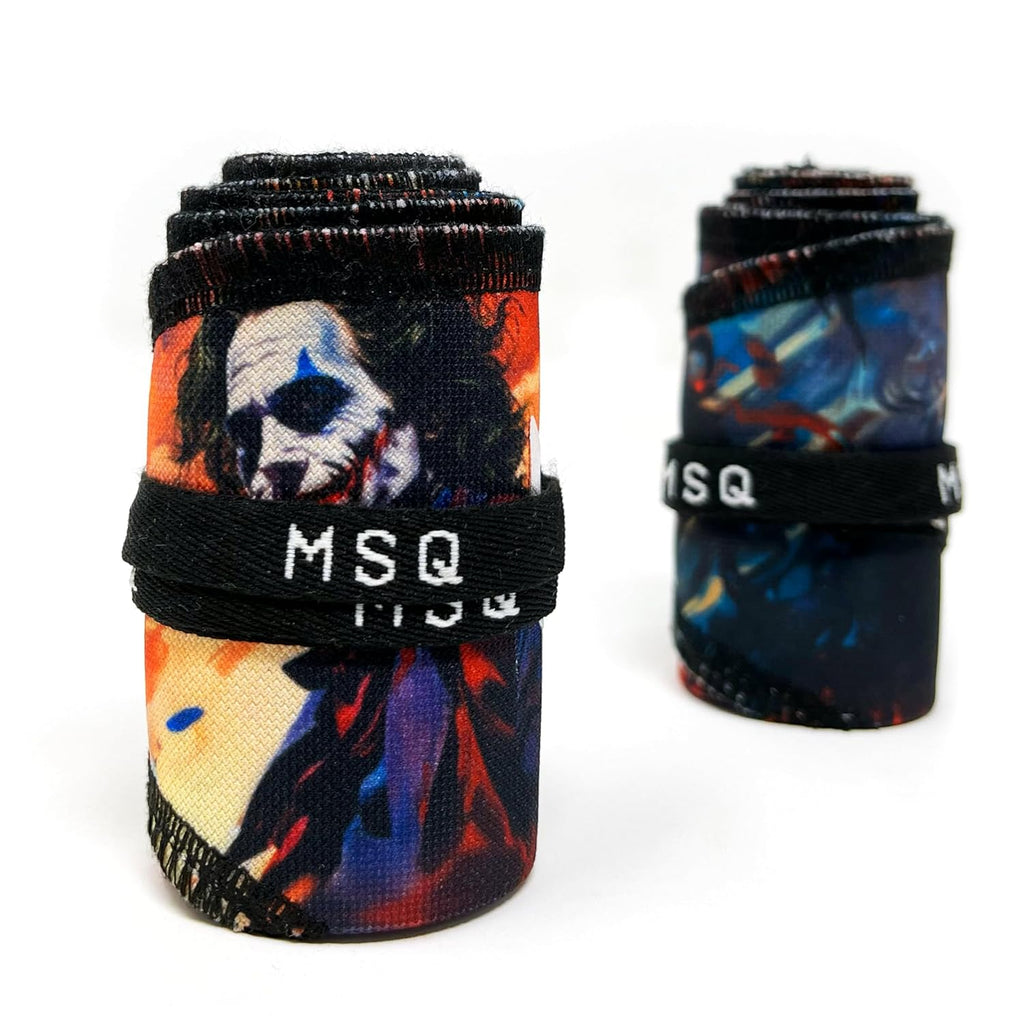 Two Gripzora wrist wraps in the Rogue Graffiti design, laid out with their vibrant red, blue, and white abstract print, perfect for calisthenics and weightlifting.